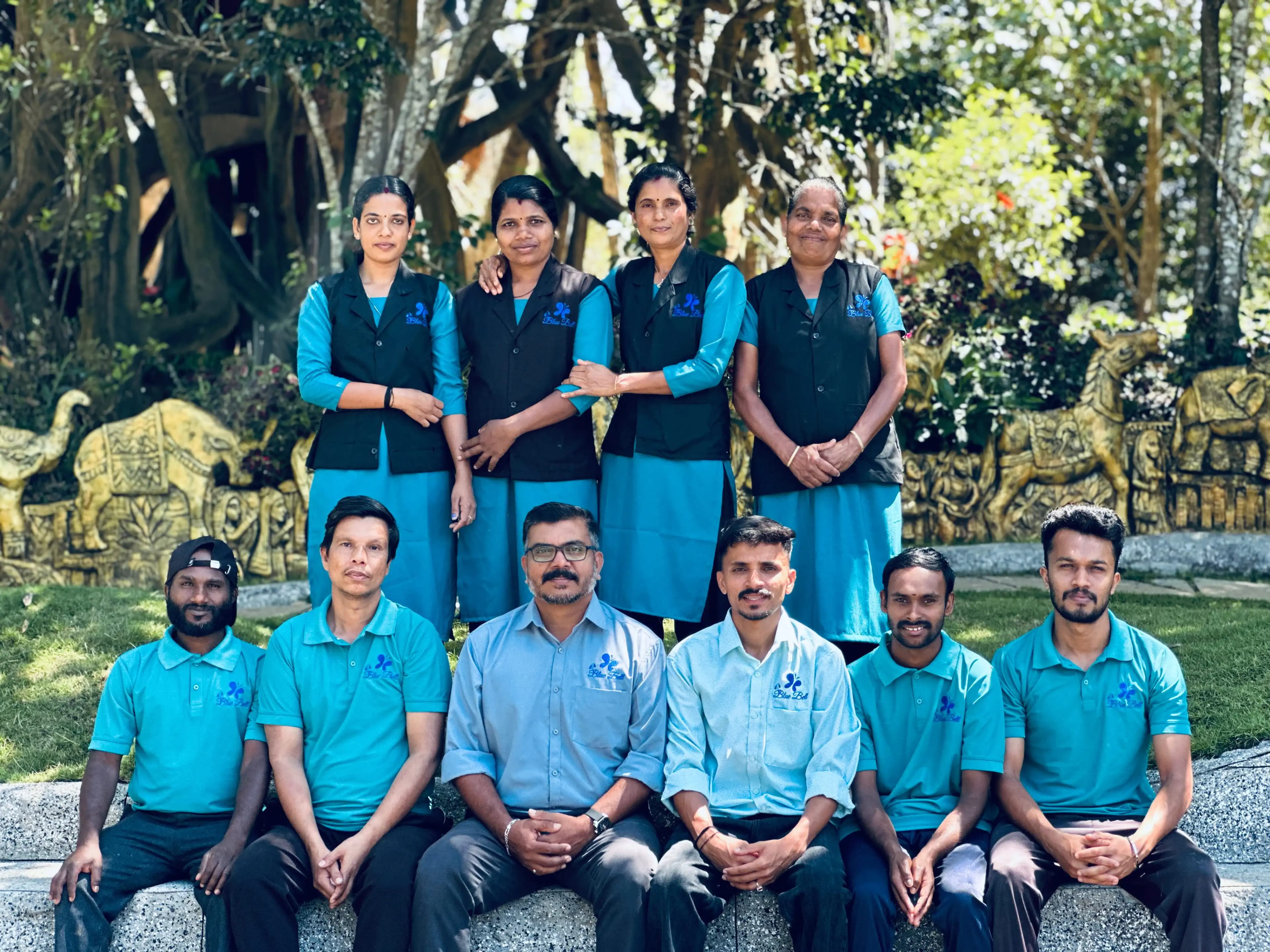 The Blue Bell team, standing together on the resort grounds